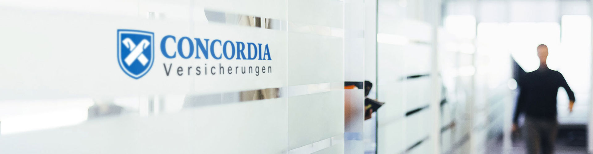 Glasfront eines Concordia Versicherung Büros